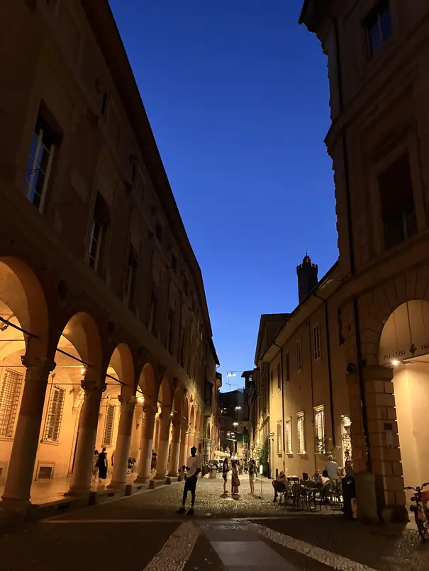 via Maggiore, Bologna, at night.